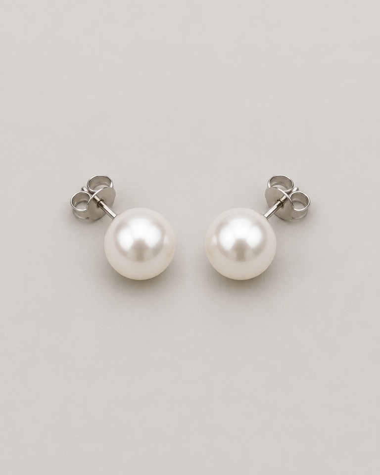 Polished faux pearl stud earrings · silver